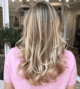 Balayage minéral Biocoiff' blond bouclé